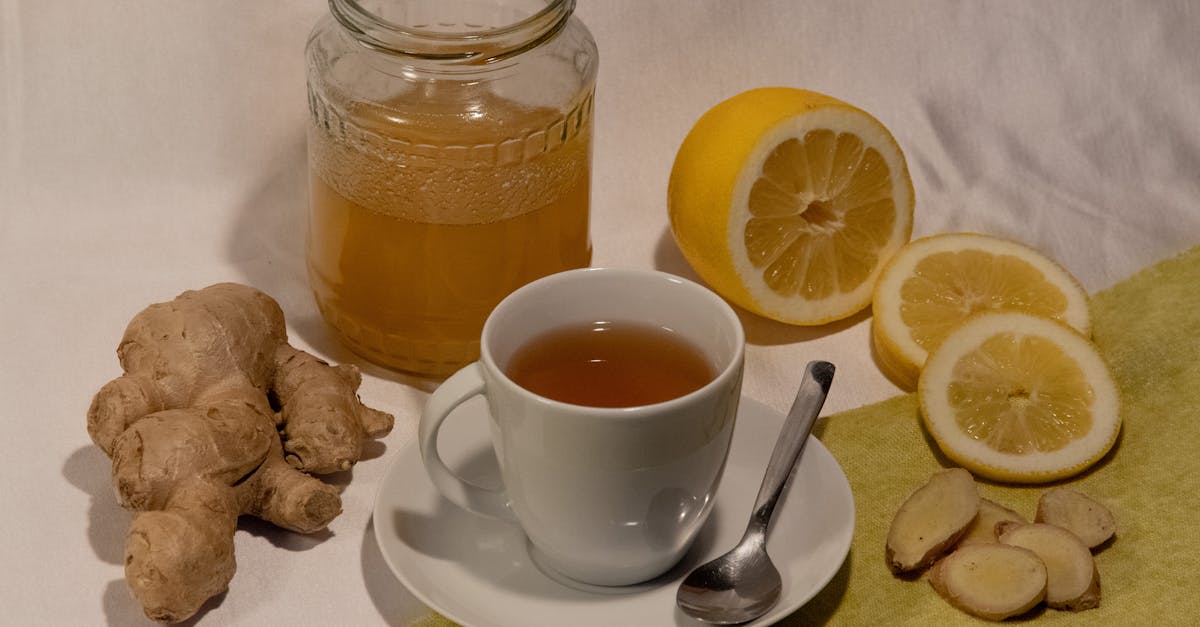 A cozy setup featuring ginger lemon tea with honey, promoting wellness and comfort.